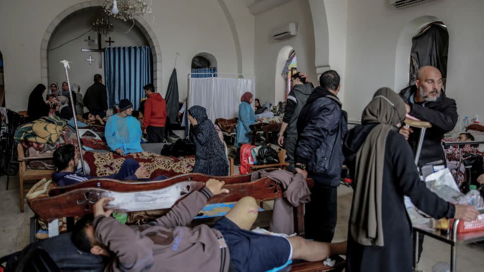 Medical workers treat wounded survivors in St. Philip, in northern Gaza, on February 13. One doctor told CNN that Israel's military campaign has "paralyzed" the health care system in Gaza. - Omar Qattaa/Anadolu/Getty Images)
