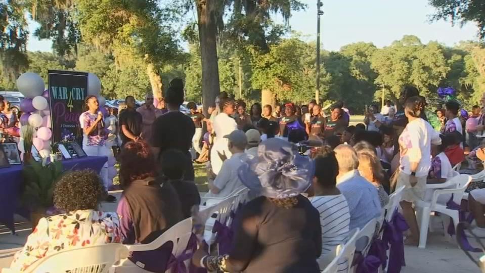 Dozens in the Ocala community honored the life of Ajike “AJ” Owens, the woman her neighbor allegedly shot and killed almost a week ago.