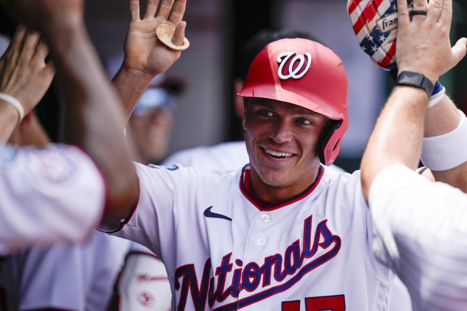 Washington Nationals Alex Call celebrates scoring during the third inning of a baseball game against the Milwaukee Brewers at Nationals Park, Wednesday, Aug. 2, 2023, in Washington. (AP Photo/Alex Brandon)