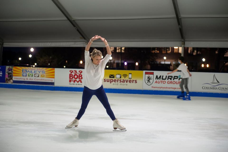 FILE - Laurie Crane ice skates at Evans on Ice on Thursday, Nov. 19, 2021. The local ice skating rink returns Nov. 9.