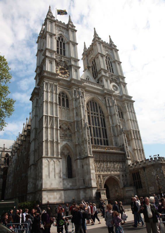 Tourists walk around Westminster Abbey on April 27, 2011, as London prepares for the royal wedding of Prince William to Kate Middleton. On December 28, 1065, Westminster Abbey was consecrated. File Photo by Hugo Philpott/UPI