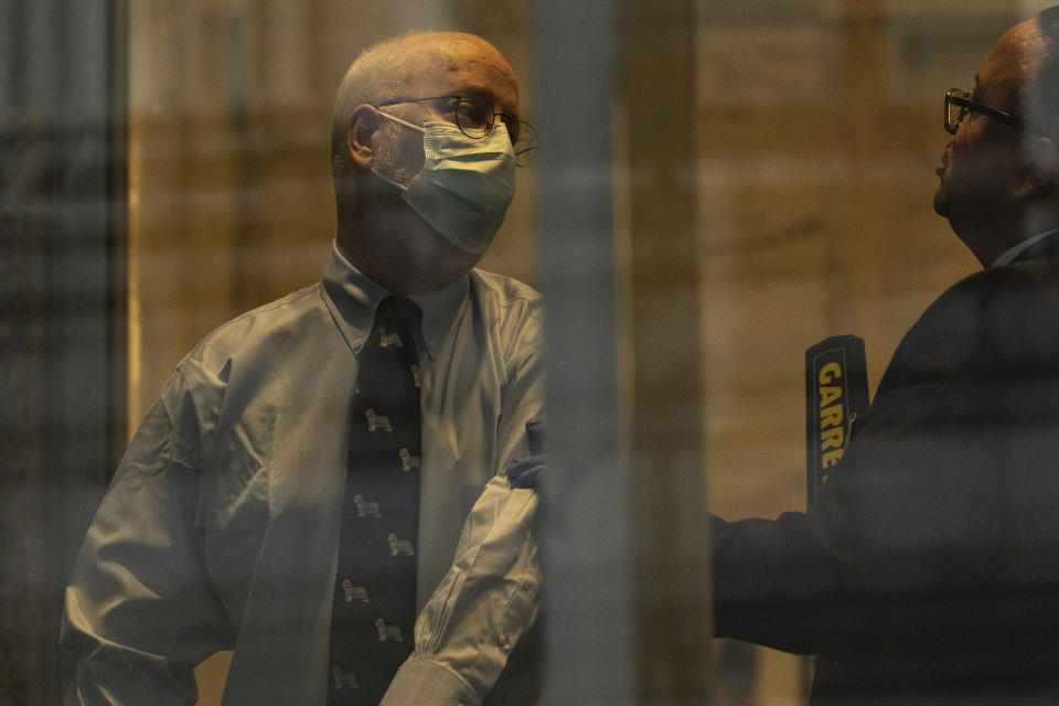 Robert Hadden waits in line at the federal court, Monday, Jan. 9, 2023, in New York. (AP Photo/Yuki Iwamura)