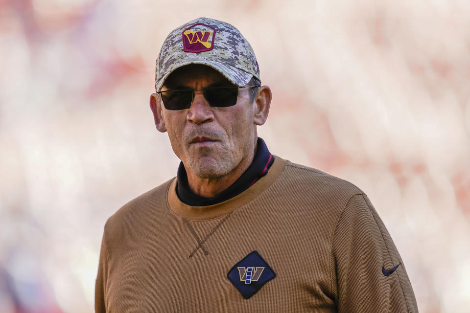 Washington Commanders head coach Ron Rivera on the field before the start of an NFL football game against the New York Giants, Sunday, Nov. 19, 2023, in Landover, Md. (AP Photo/Stephanie Scarbrough)