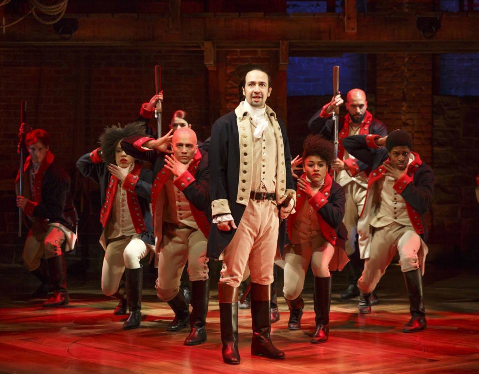 Lin-Manuel Miranda, center, in "Hamilton" at the Public Theater in New York, before the move to Broadway.