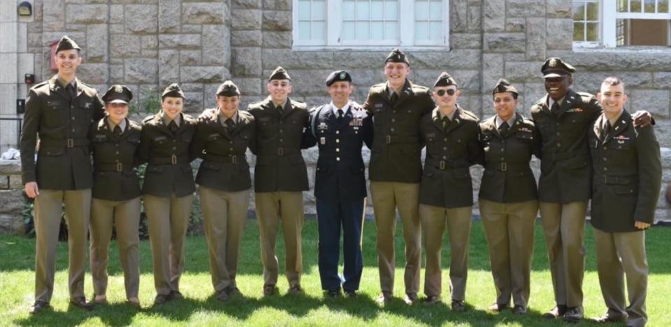 Lt. Col. Tad Granai, center, with URI’s commissioning class of 2023: From left, 2nd Lieutenants Jack Eustis, Madison Christiana, Katie Bzowyckyj, Megan Brigham, James Koester, James Morrissey, Patrick Lane, Chantel Rosario de Los Santos, David Falano and Christian Ditusa.