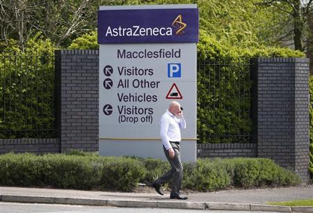 A man walks past an AstraZeneca site in Macclesfield, central England April 28, 2014. REUTERS/Darren Staples