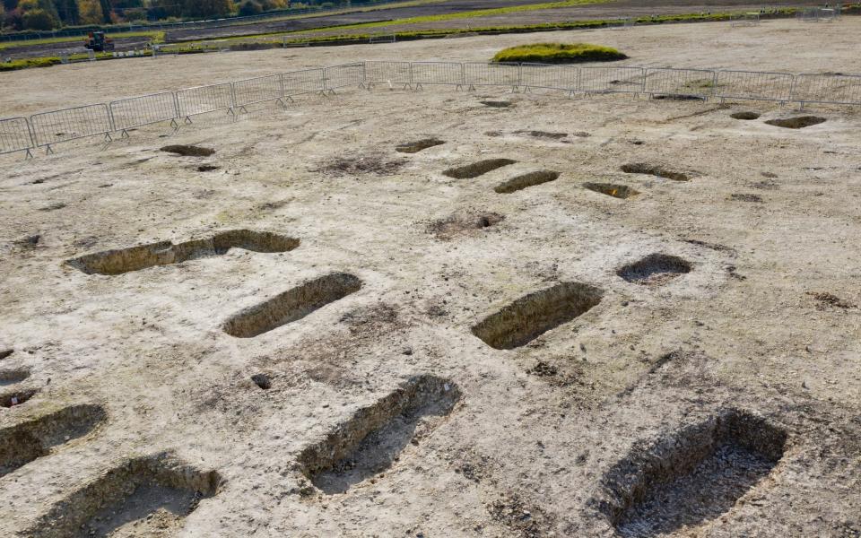 Archaeologists working on the HS2 site have discovered a burial ground containing nearly 140 graves - PA