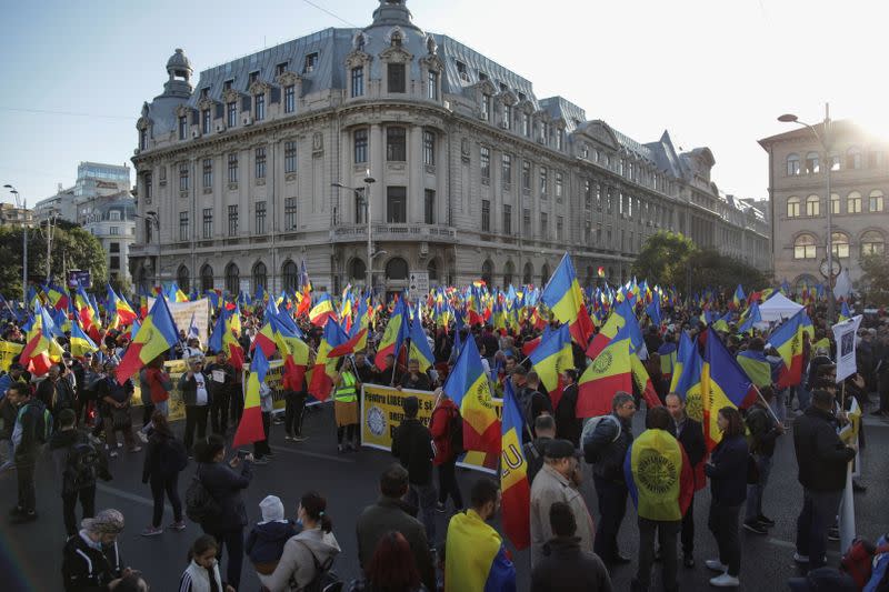 People rally demanding an end to coronavirus restrictions in Bucharest