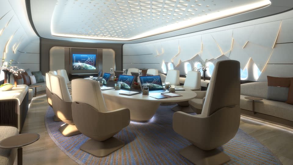 The dining area holds a table, 11 individual seats, and divans, pictured here in a rendering. - Lufthansa-Technik