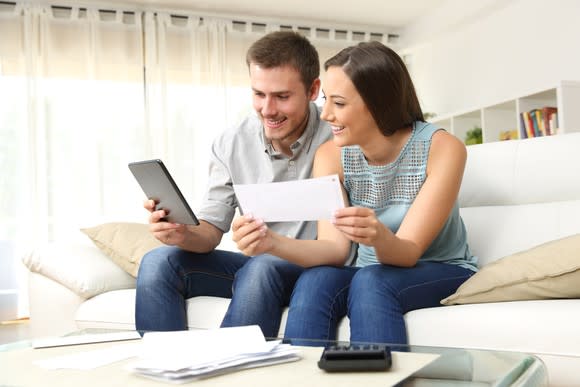 Young couple reviewing documents.