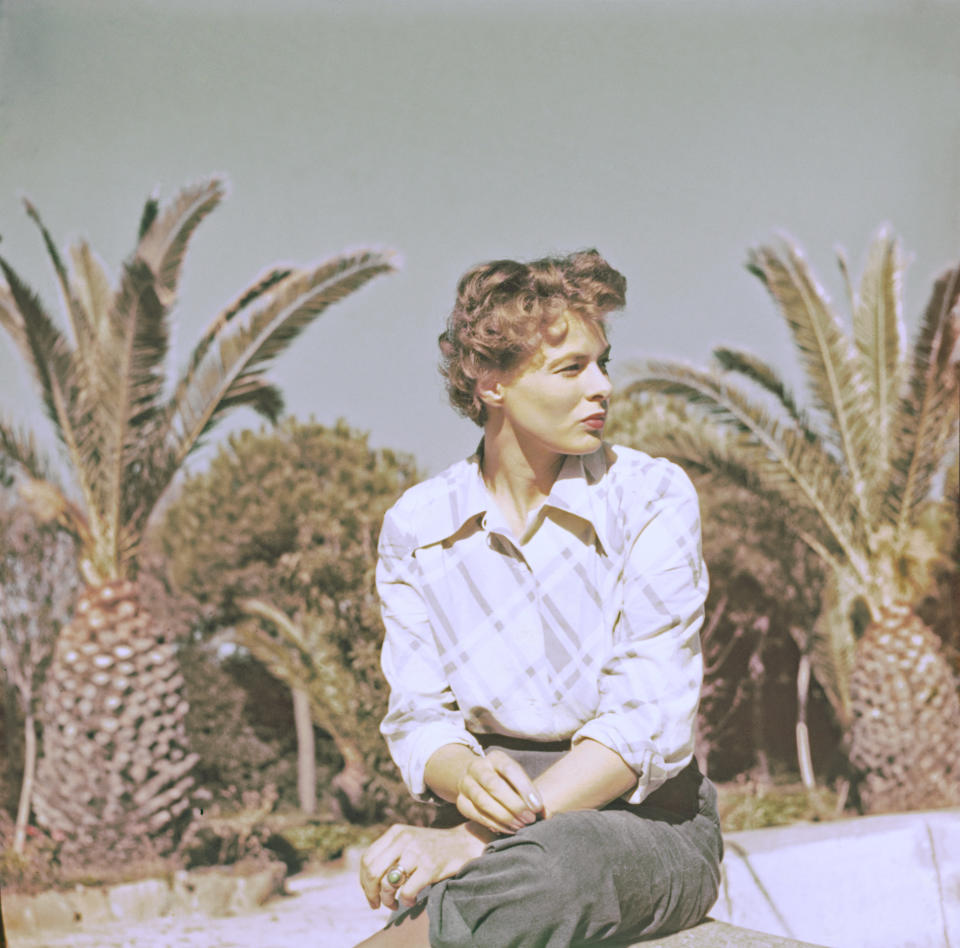 The Swedish actress sitting outside among the palm trees.&nbsp;
