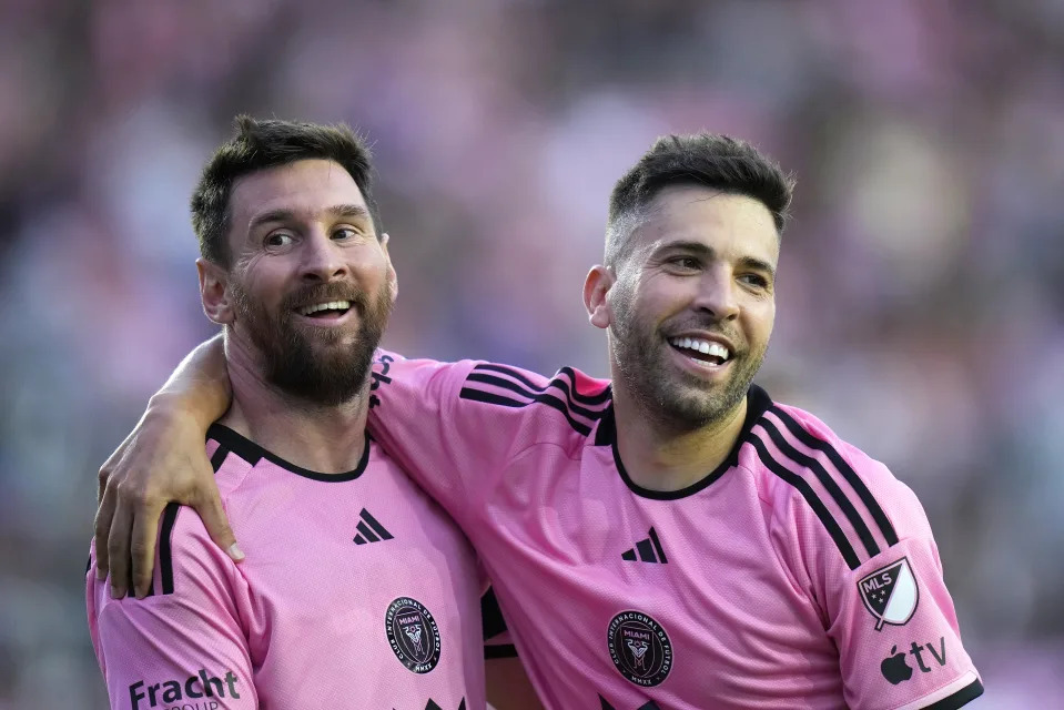 Lionel Messi celebrates with Jordi Alba after scoring a goal during the second half against Orlando City on Saturday at Chase Stadium in Fort Lauderdale, Florida. (Photo by Rich Storry/Getty Images)