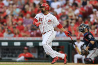 Cincinnati Reds' Tony Santillan hits a double during the third inning of a baseball game against the Atlanta Braves in Cincinnati, Thursday, June 24, 2021. (AP Photo/Aaron Doster)