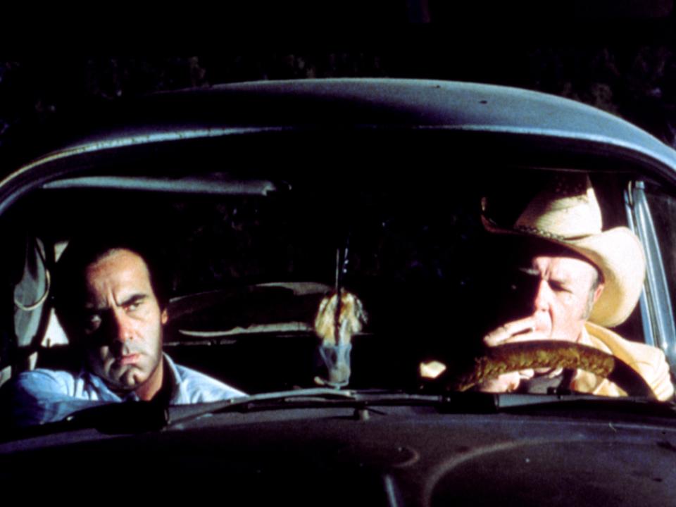 Dan Hedaya and M. Emmet Walsh drive in a car in a scene from the Coen Brothers' "Blood Simple."