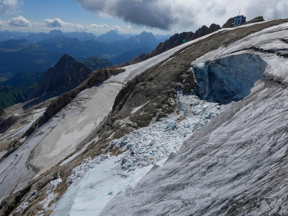 collapsed mountaintop glacier spilled out in snow avalanche
