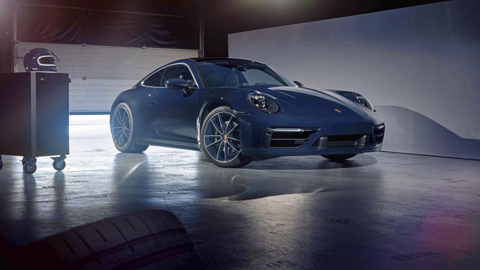 This photo provided by Porsche shows the 2021 Porsche 911. The Porsche 911 is available in Carrera 4 and Carrera 4S trims, both of which come with all-wheel drive. (Courtesy of Porsche Cars North America via AP)