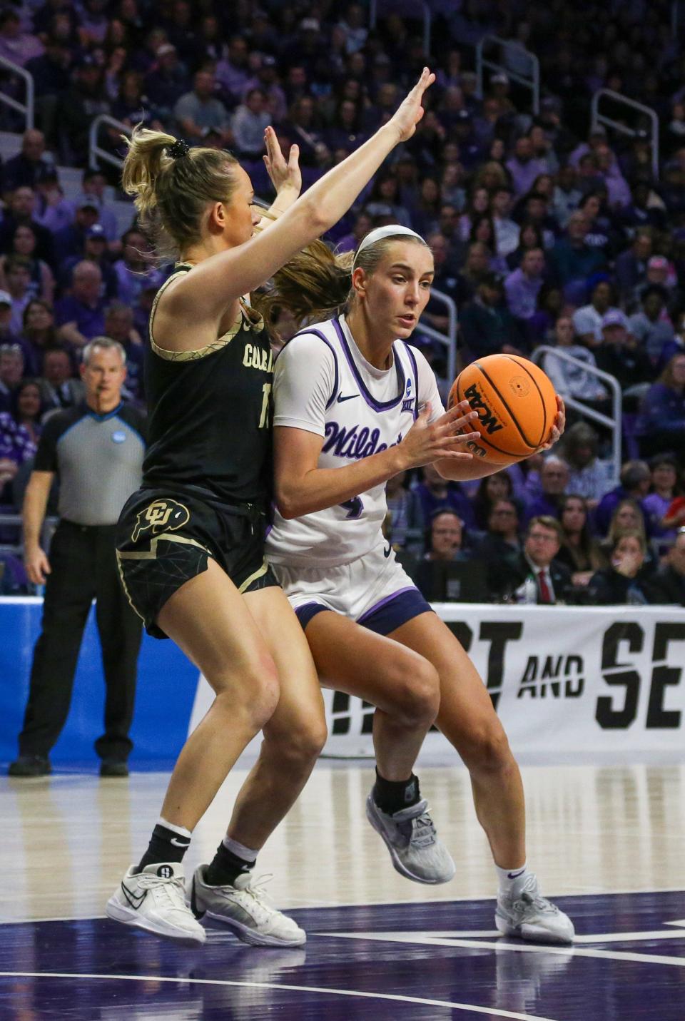 Kansas State guard Serena Sundell (4) looks for an opening against Colorado's defense Sunday during their second-round NCAA Tournament game at Bramlage Coliseum.