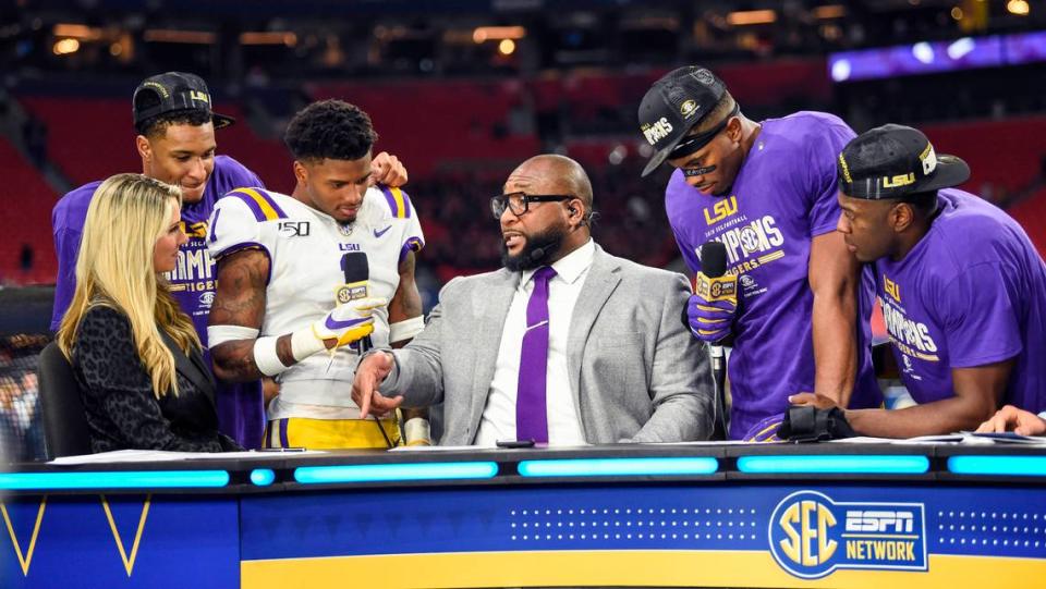 LSU players are interviewed on the set of ESPN SEC Network after defeating the Georgia Bulldogs in the 2019 SEC Championship Game at Mercedes-Benz Stadium. Dale Zanine/USA TODAY Sports