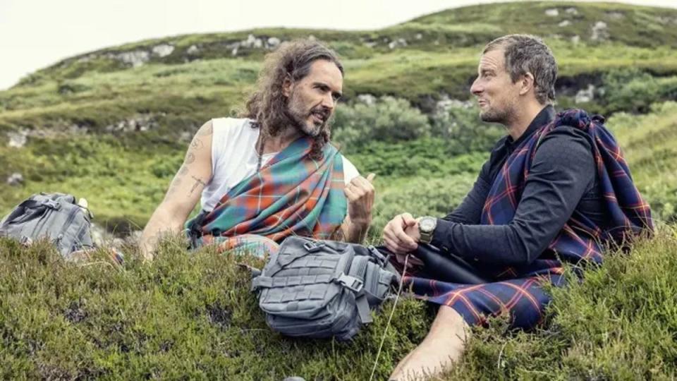 Bear Grylls has stepped down as Chief Scout after photos emerged of him baptising Russell Brand (Nat Geo)