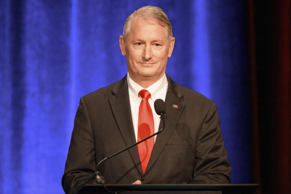 FILE – Republican Mike Crane listens at the 3rd Congressional District debate hosted by the Atlanta Press Club on April 28, 2024, in Atlanta. Voters are choosing between Crane and four other Republicans in a primary to decide the GOP nominee on Tuesday, May 21, 2024. (AP Photo/Jason Allen, File)