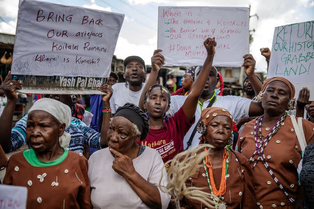 <p>LUIS TATO/AFP via Getty</p> A demonstration against King Charles and Queen Camilla's visit to Kenya on Oct. 30, 2023