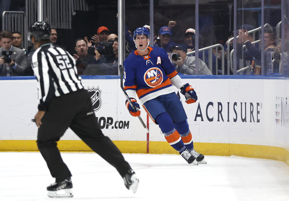 New York Islanders center Brock Nelson (29) reacts after scoring a goal against the Buffalo Sabres during the first period of an NHL hockey game, Saturday, Oct. 14, 2023, in New York. (AP Photo/Noah K. Murray)