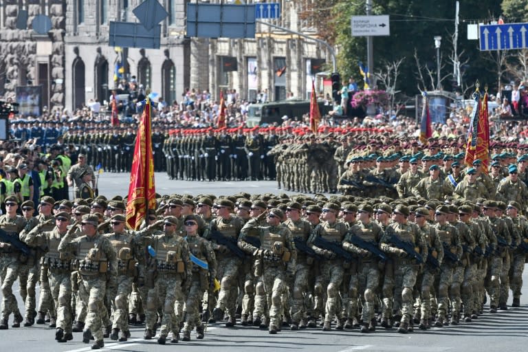 Ukrainian servicemen march in Kiev in a military parade to celebrate Independence Day, 27 years after Ukraine broke away from the Soviet Union