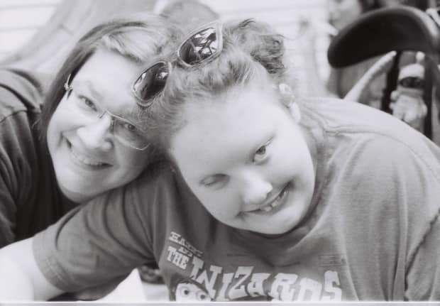 Jennifer Baumbusch, an associate professor in nursing at the University of B.C. shown here at left, says she worries about being excluded from decisions about the care of her daughter Ellanore. (Submitted by Jennifer Baumbusch - image credit)