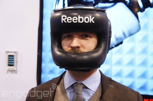 Testing Reebok's Checklight head impact monitor with a human punching bag