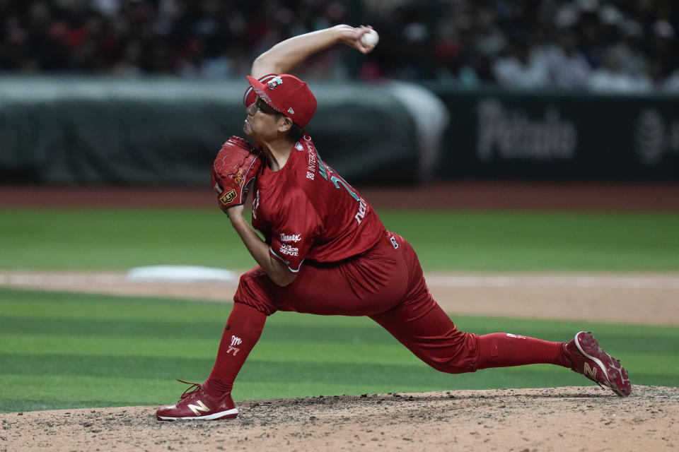 Diablos Rojos' pitcher Tomohiro Anraku throws against the New York Yankees at 9th inning during an exhibition baseball game at Alfredo Harp Helu Stadium in Mexico City, Monday, March 25, 2024. (AP Photo/Fernando Llano)