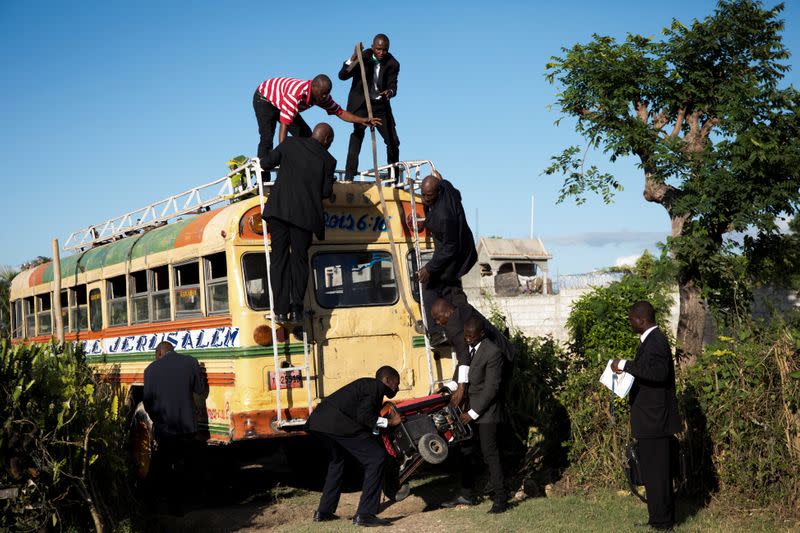 The Wider Image: Haiti's brides beat hurricanes, power cuts and protests to wed in style