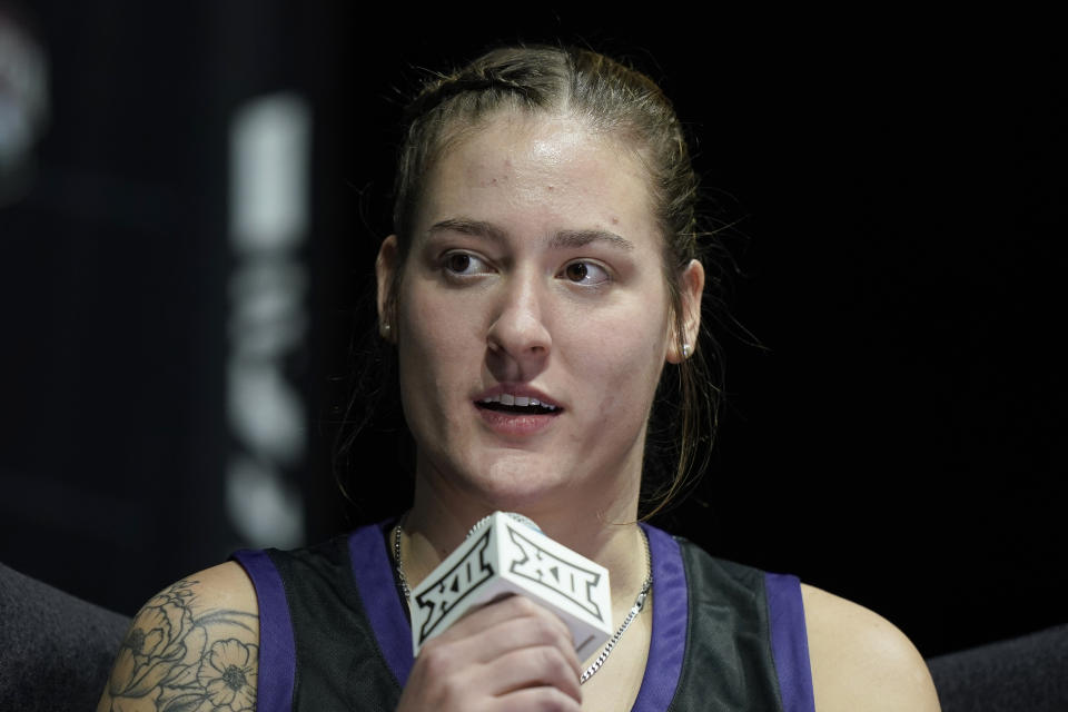 TCU's Sedona Prince addresses the media during the NCAA college Big 12 women's basketball media day Tuesday, Oct. 17, 2023, in Kansas City, Mo. (AP Photo/Charlie Riedel)