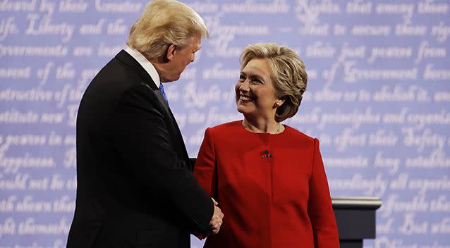 Trump and Clinton shake hands before the debate. Photo: AP