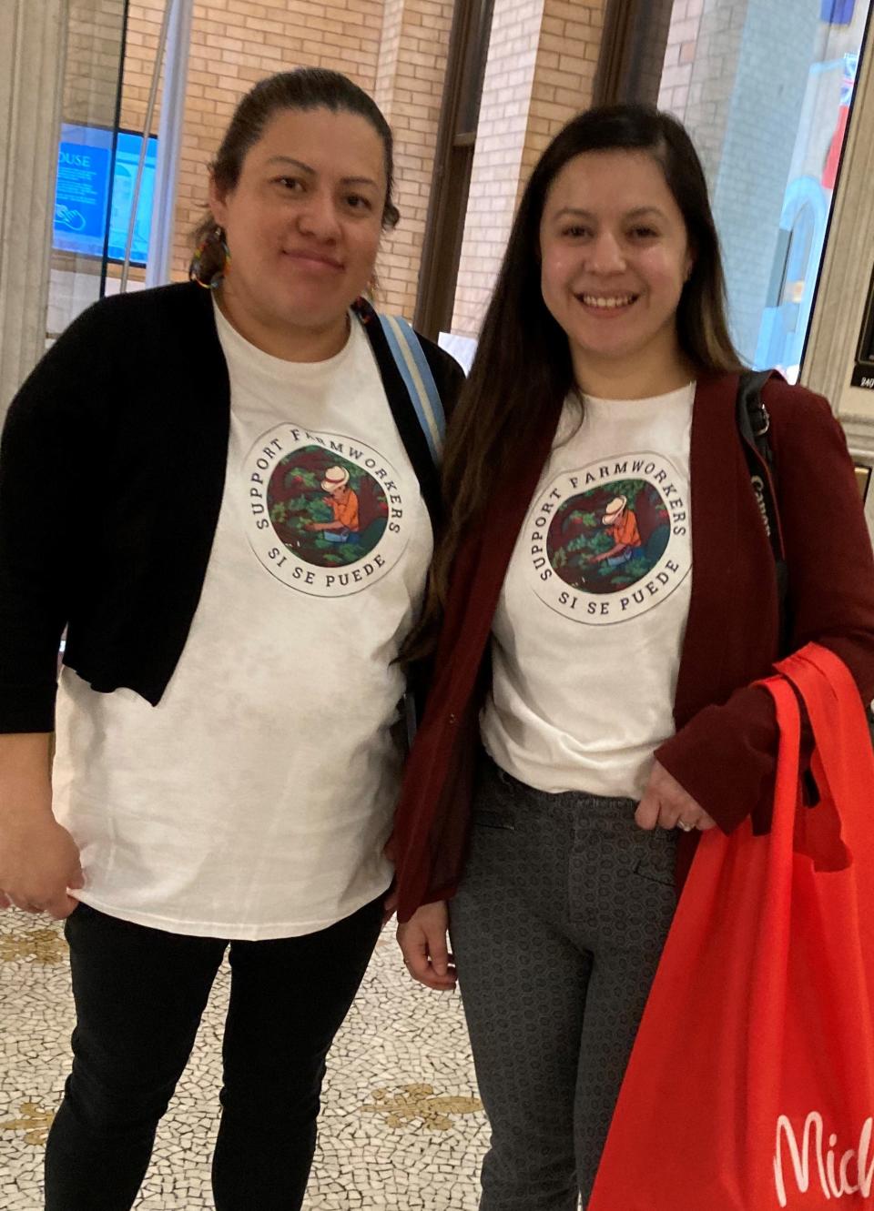 Patricia Rosales, an activist with Pioneer Valley Workers Center, left and Claudia Quintero, an attorney with the Central West Justice Center, visit legislators in the State House Tuesday to advocate for state minimum wage for farmworkers.