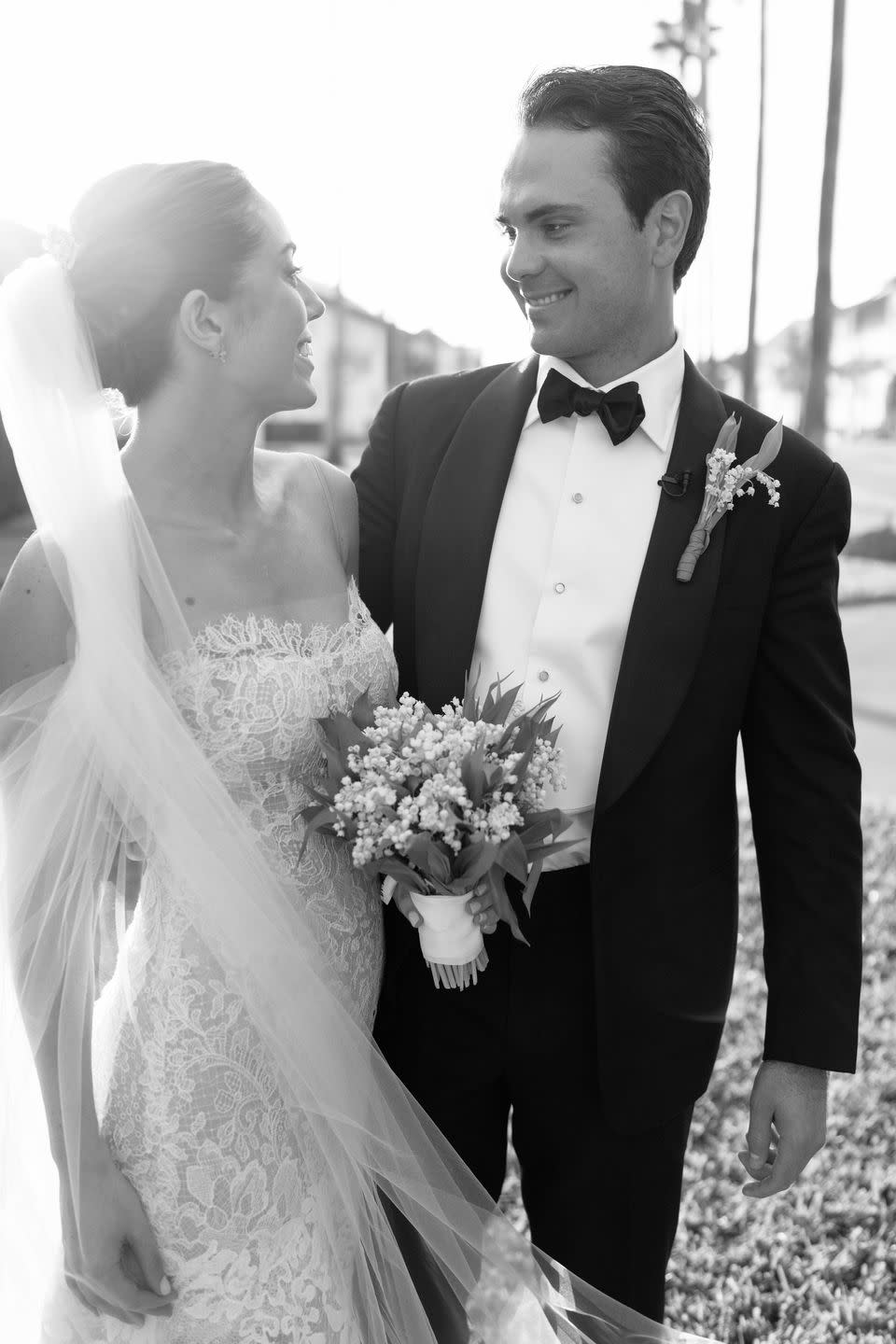 a man and woman in wedding attire