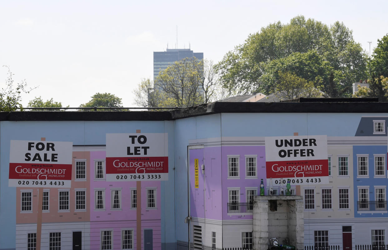 House prices An estate agent property advertisement is seen painted on a wall in London, Britain, May 15, 2019. REUTERS/Toby Melville