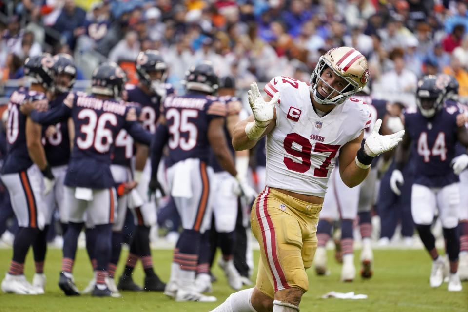 San Francisco 49ers' Nick Bosa celebrates his sack of Chicago Bears' Justin Fields during the first half of an NFL football game Sunday, Sept. 11, 2022, in Chicago. (AP Photo/Charles Rex Arbogast)