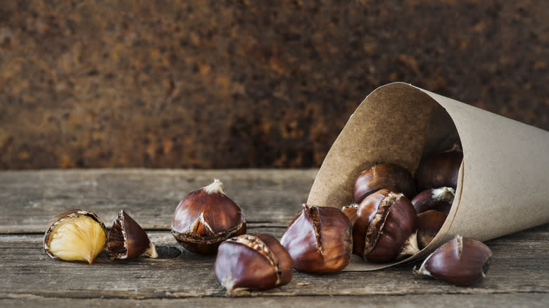 Chestnuts spilling out of a bag