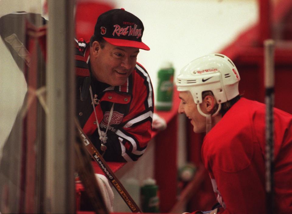 Detroit Red Wing coach Scotty Bowman shares a laugh with Sergei Fedorov at the end of practice May 1, 1997 at Joe Louis Arena. They were scheduled to open round 2 of playoff action the next day at the Joe.