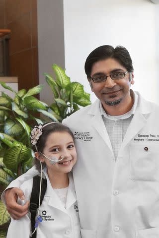 <p>Courtesy Rebecca's Wish</p> Rebecca Taylor and Dr. Sandeep Patel