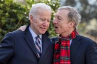 Democratic U.S. presidential candidate Tom Steyer speaks with fellow Democratic U.S. presidential candidate and former U.S. Vice President Joe Biden during the Martin Luther King Jr. Day parade in Columbia