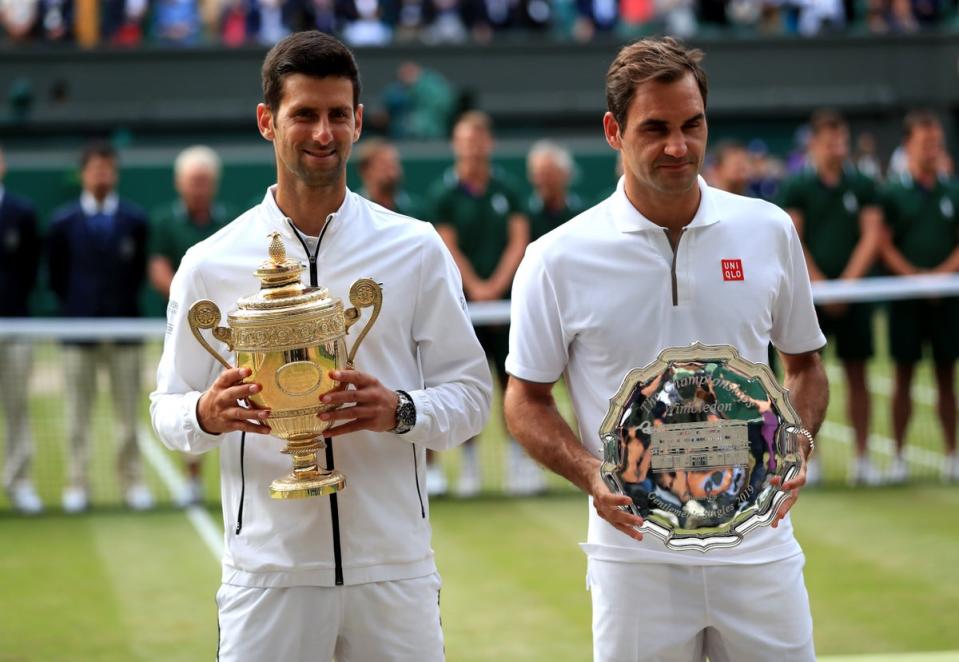 Roger Federer and Novak Djokovic faced each other in three Wimbledon finals (Mike Egerton/PA) (PA Archive)
