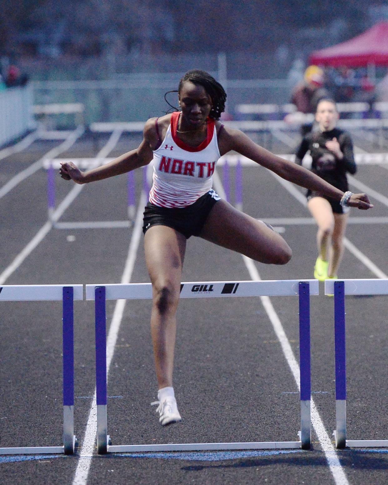 North Hagerstown's Anthonette Bantamoi races to a third-place finish in the girls 300 hurdles at Smithsburg's Charas Heurich Invitational.