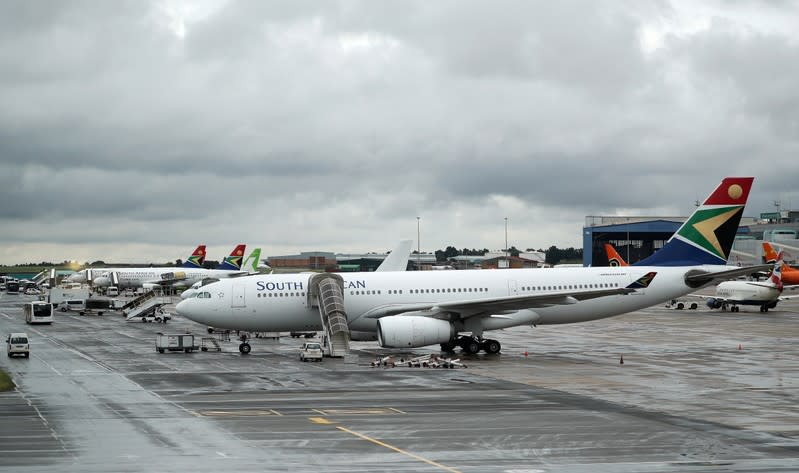 FILE PHOTO: SAA Airbus A330 aircraft stand on the runway at O.R. Tambo International Airport in Johannesburg