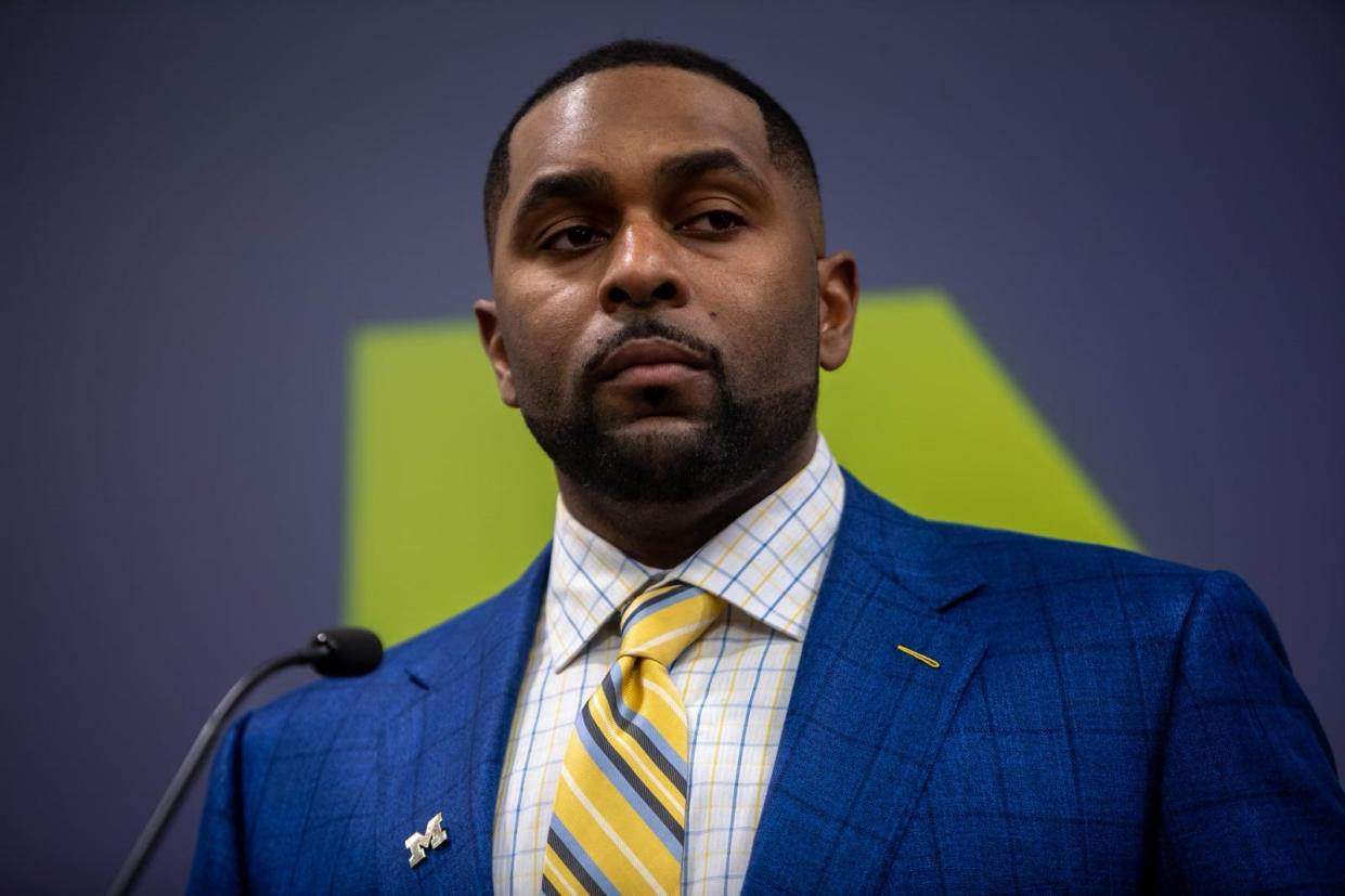 Sherrone Moore, Michigan’s new head coach, speaks in front of family, media and faculty members during a news conference inside the Junge Family Champions Center in Ann Arbor on Saturday, Jan. 27, 2024.