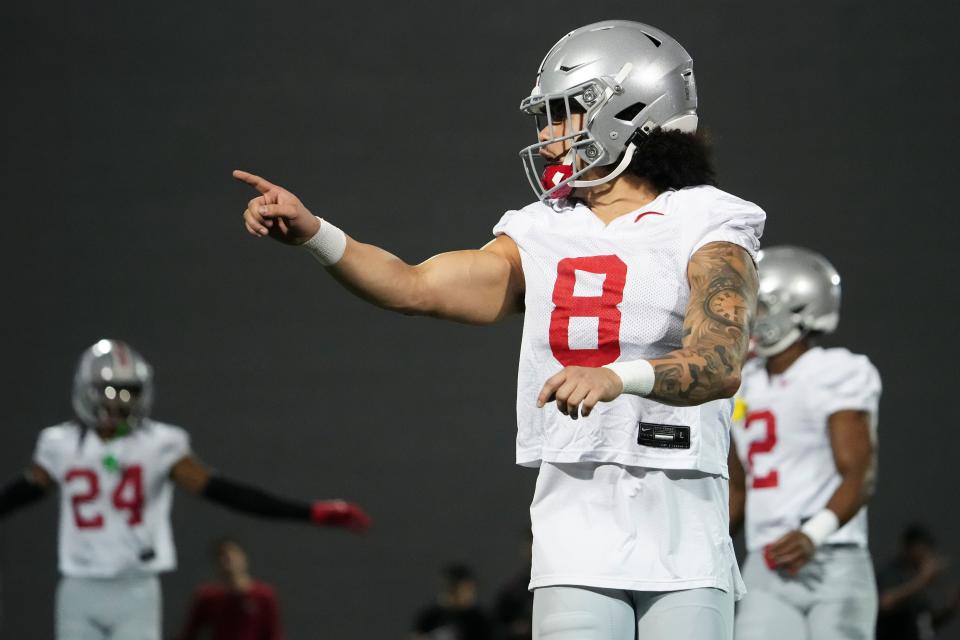 Mar 7, 2024; Columbus, OH, USA; Ohio State Buckeyes safety Lathan Ransom (8) motions during spring football practice at the Woody Hayes Athletic Center.