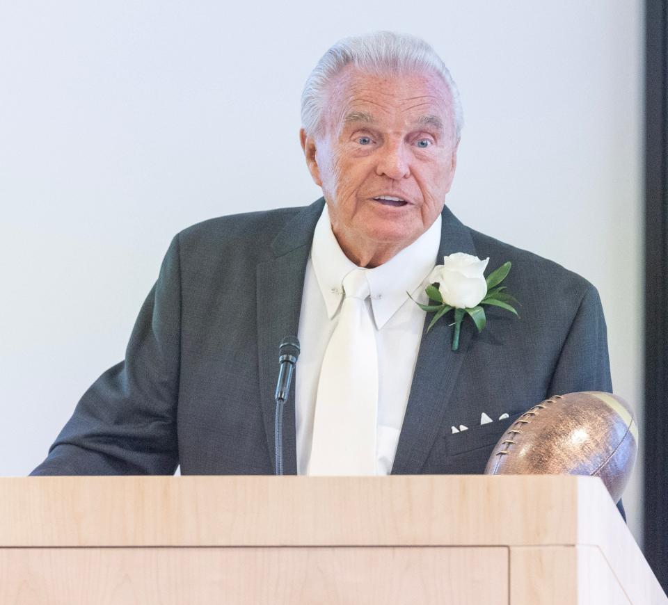 McKinley's Ron Carnahan delivers his induction speech at the Stark County High School Football Hall of Fame Ceremony at the Pro Football Hall of Fame.