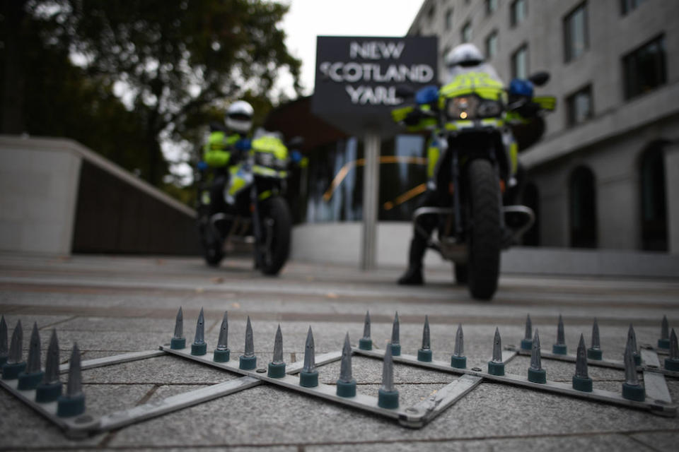 Metropolitan Police officers demonstrate a new stinger device aimed at combating moped enabled crimes (Picture: PA)