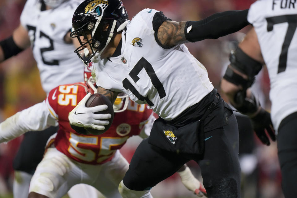 Jacksonville Jaguars tight end Evan Engram (17) runs against the Kansas City Chiefs during the second half of an NFL divisional round playoff football game, Saturday, Jan. 21, 2023, in Kansas City, Mo. (AP Photo/Charlie Riedel)