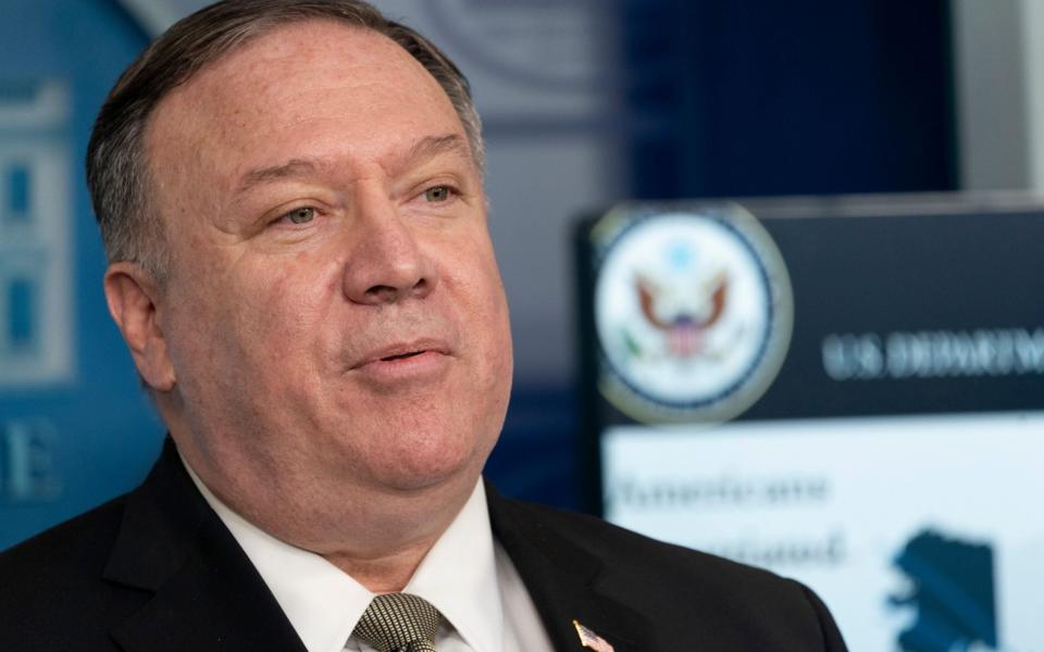 Mike Pompeo said China should "open up" about the cause of the virus - CHRIS KLEPONIS/EPA